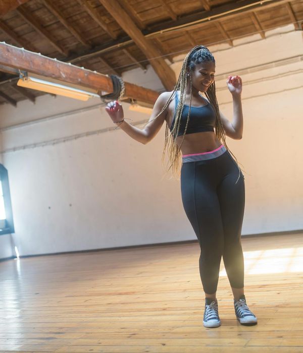 Woman feeling energetic and vibrant during a light exercise.